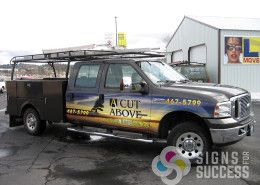 Partial pickup wrap with a wide band across sides of this Spokane Valley pickup, designed and wrapped by Signs for Success