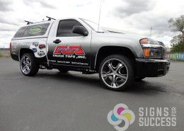 Get the look of a full wrap with a wide band wrapped around sides and tailgate, custom graphics designed at Signs for Success in Spokane and Spokane Valley