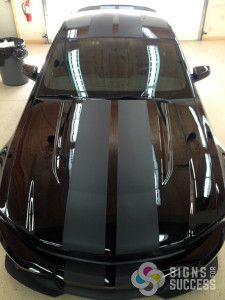 Signs for Success can add matte black accents and rally stripes or a full matte black color change matte wraps to your muscle car in Spokane and Chewelah