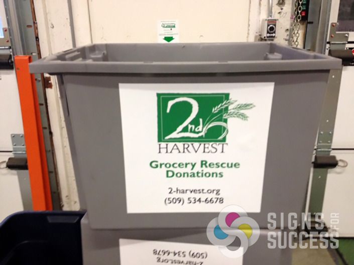 2nd Harvest handles these tubs roughly and wanted a sticker decal that would really grip, so we used an intermediate vinyl label product that has a very high tac adhesive, Signs for Success in Spokane, vinyl signs spokane