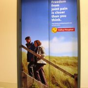 Adding your message or advertisement to the Doors of the Elevator really add impact to your message, Like this at Spokane Valley Hospital installed for Allegra Signs, elevator wraps spokane