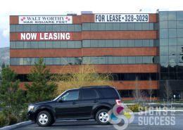 Large banners for advertising For Lease Space on Spokane Valley buildings by Signs for Success