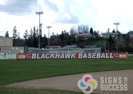 100 foot banner for Blackhawk Baseball in Cheney on mesh banner, sponsored by ARMY, printed by Signs for Success in Spokane