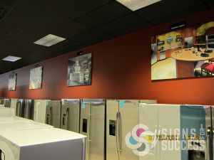 Fred's Appliance stores decorated their walls with dozens of large high res photos, printed on canvas and gallery wrapped for a unique decorating for this retail store