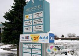 Kidds Dental in North Spokane and Spokane Valley needed a wrap around banner for this monument sign as temporary signage until their big sign went in