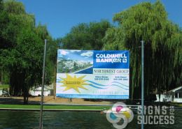 Realtors can use banners for waterfront or large properties, like this Coldwell Banker mesh banner for LakeShore Estates in Deer Park and Spokane
