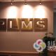 Dimensional letters can be frontlit like these for PLMS in Spokane, Brushed gold aluminum metal laminate on acrylic, mounted with studs for a great looking lobby sign, law office signs