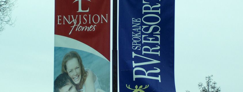 Pole banners on flexible banner hardware to resist wind damage in Spokane and Airway Heights, fast by Signs for Success, pole banners airway heights