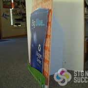 This display has multiple layers cut from gator and styrene to create a dimensional look that is affordable in Spokane, custom life sized cutout standees with easel, 3D standees