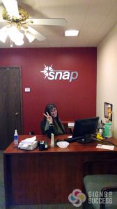 Snap had a new logo and wanted metal laminate dimensional letters on their entrance office lobby wall in their new offices in Spokane, Call Signs for Success