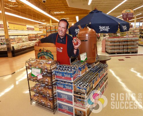 Life Sized Standee for grocery store advertising shows Tom Sherry at Spokane Trading Co Stores, cut out of Styrene, Gator, or Coro, free standing coroplast signs spokane valley