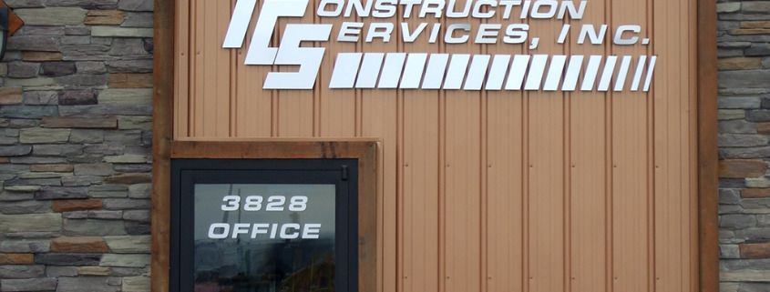 Dimensional aluminum letters and metal laminate letters can be a great addition for adding your logo to your building like Talisman Construction in Spokane, outdoor dimensional letters