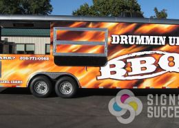 Drummin Up BBQ gets more business with this custom concession trailer wrap designed & installed by Signs for Success in Spokane, Call now for fast signs service, vehicle graphics spokane