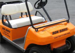Golf cart wrap, changing color from white to bright orange, adding logo and text over colorchange, Wrap your golfcart now by Signs for Success, fast sign service in Spokane
