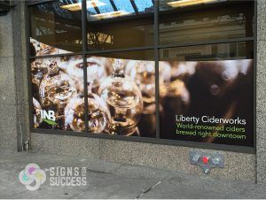 INB custom window wraps in downtown Spokane, printed and installed by Signs for Success