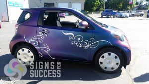 custom car wraps spokane vinyl overlay design on Scion IQ